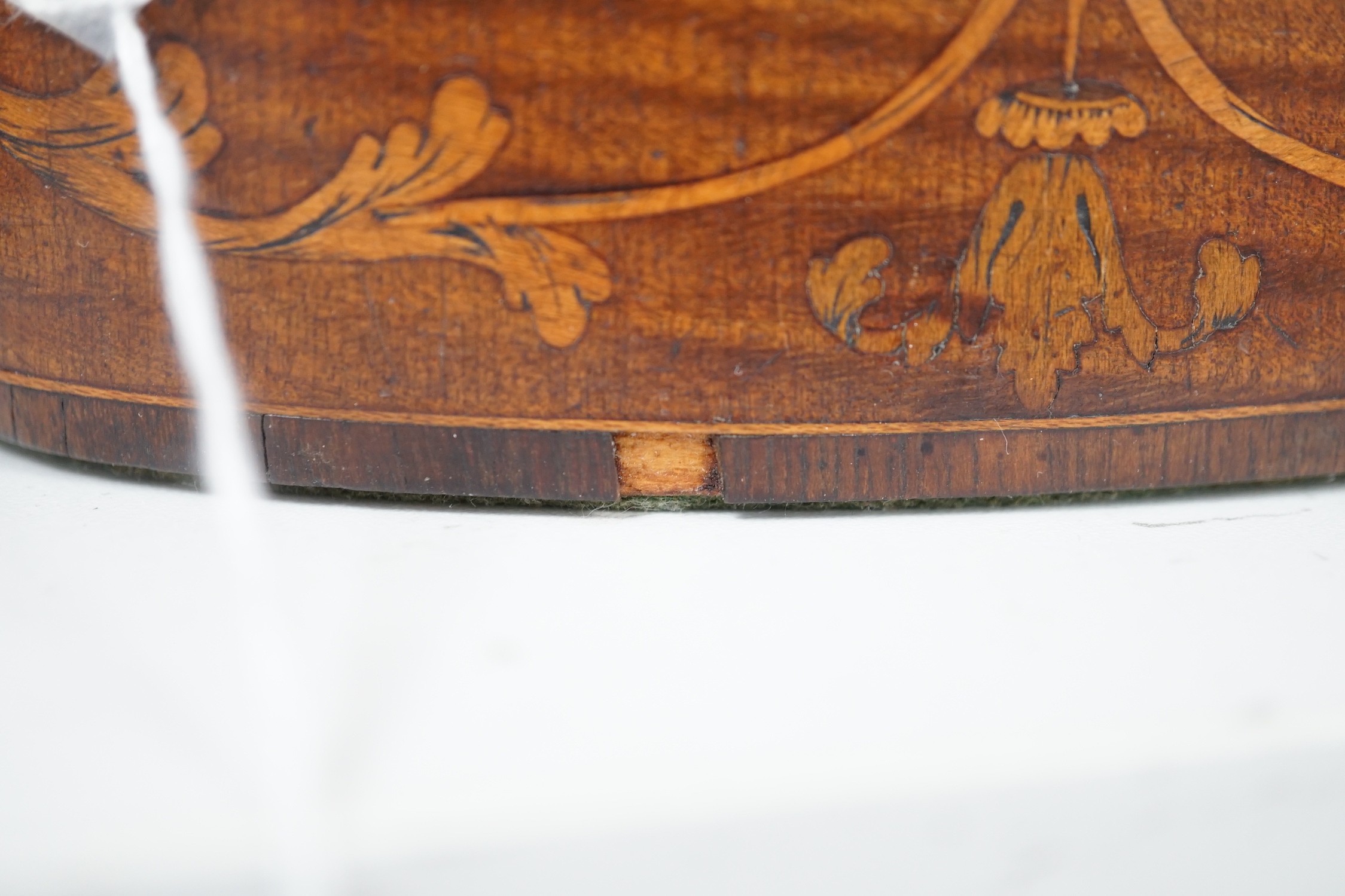 A George III oval harewood and marquetry tea caddy, c.1790, 12cms high x 15cms wide